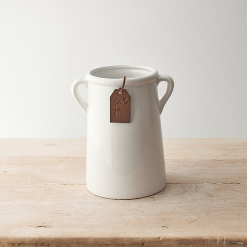 White Ceramic Vase  on Wooden table