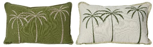 Two decorative pillows with palm tree designs on a green and white background.