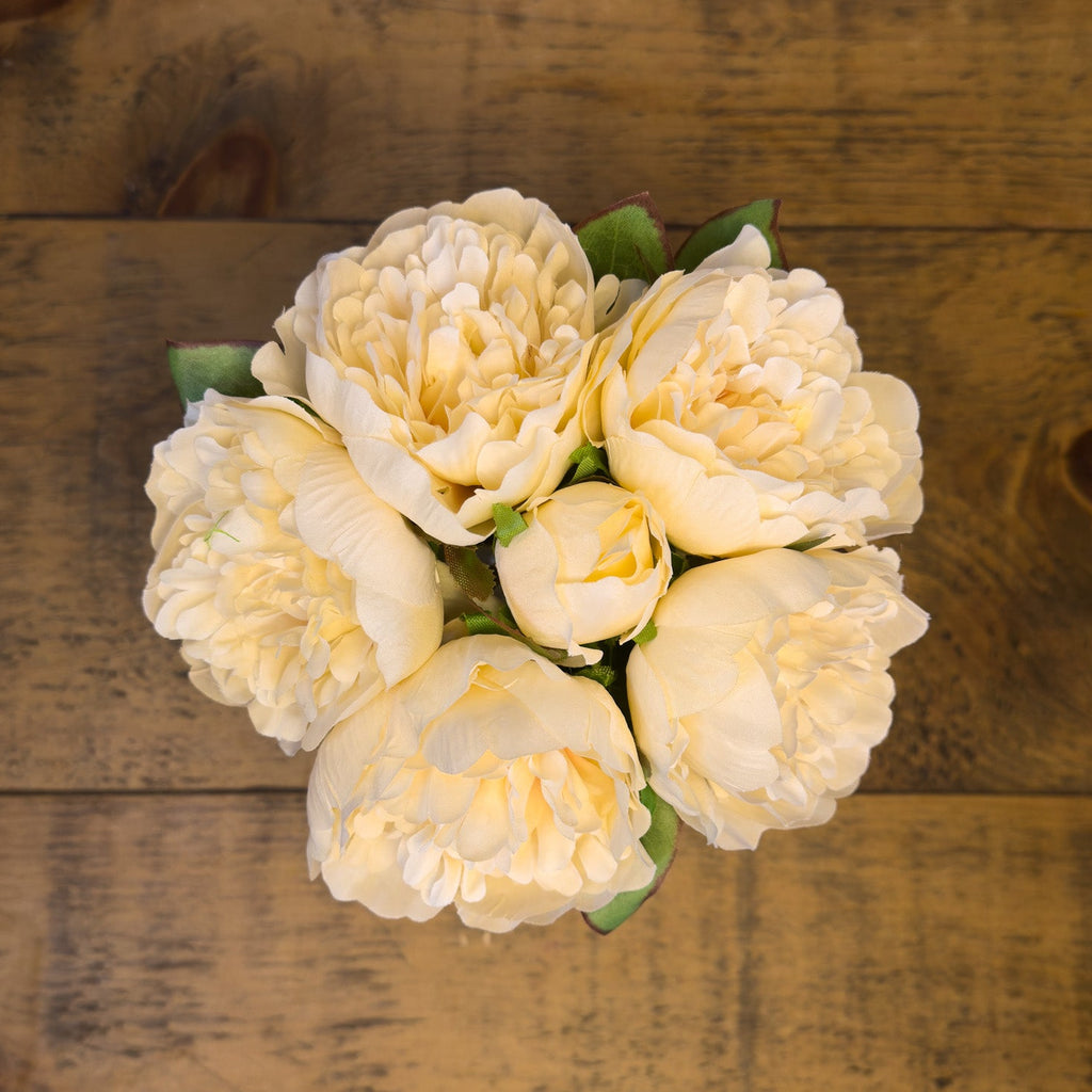 Flower Bouquet of Peonies on a wooden surface